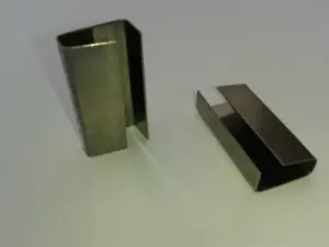 Abrazaderas, cinta perforada y complementos inox